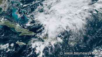 Oscar weakens and is no longer a tropical cyclone as it heads out to sea