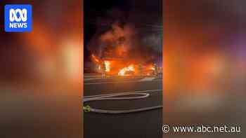'Oh my god, get out of the house': Residents evacuated after suspected 'ram raid' attack sparks dramatic blaze at tobacconist
