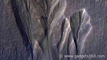 NASA Study Suggests Microbial Life May Thrive Beneath Martian Ice