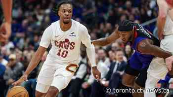 Mobley leads Cavaliers past Raptors 136-106 in home opener; Quickley injured