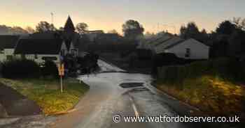 Flooding 'chaos' after suspected burst main as road closure expected