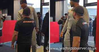 AJ surprises kids at Watford gym and sets punching machine record