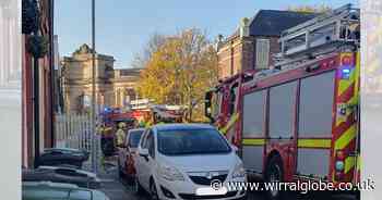 Firefighters called to skip fire in Birkenhead