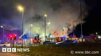 Fire crews battle to save 400-year-old pub