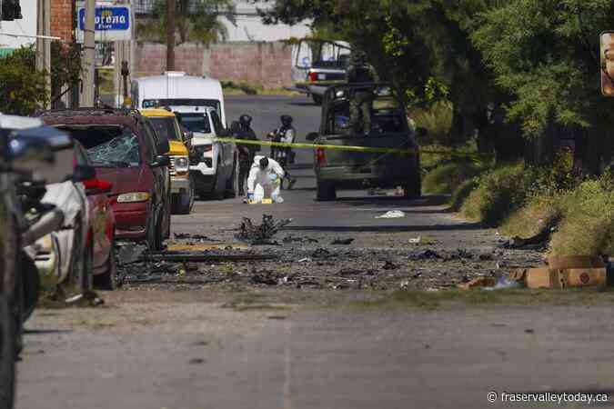 A car bomb explodes outside a police station in western Mexico, wounding 3 officers