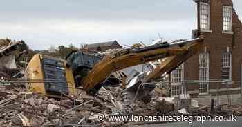 Oops! Update after demolition digger topples into town centre rubble