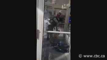 Dollarama security guard charged with assault after in-store beating caught on camera