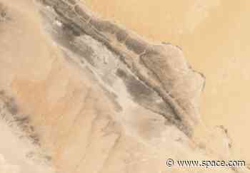 Before and after satellite images show lakes appearing across Sahara after deluge of rain soaks desert