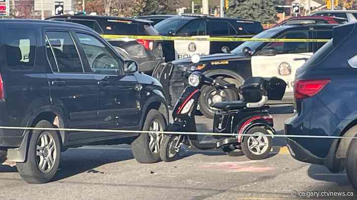 1 in hospital after motorized scooter and vehicle crash in mall parking lot