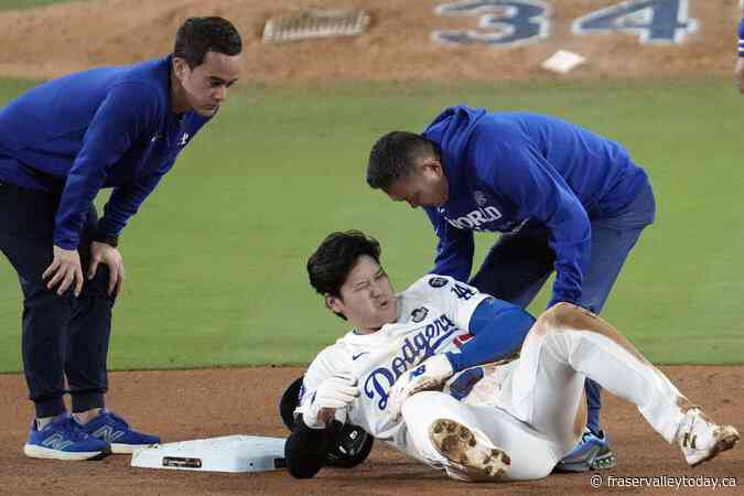 Ohtani injures left arm sliding into second during World Series Game 2, severity uncertain