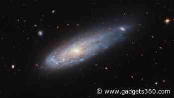 Hubble Space Telescope Unveils IC 3225, the Cannonball Galaxy in Virgo