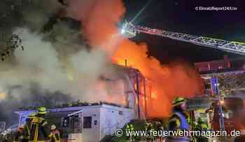 Mitarbeiter springen aus brennendem Haus