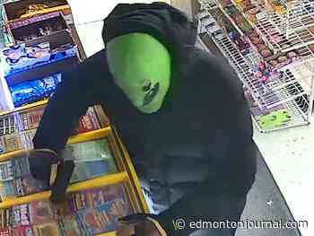 Man in green alien mask robs west Edmonton store at gunpoint: EPS