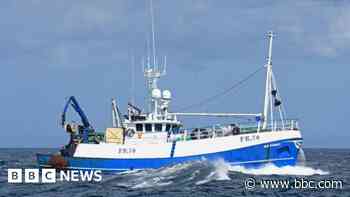 Crew rescued after fishing boat sinks