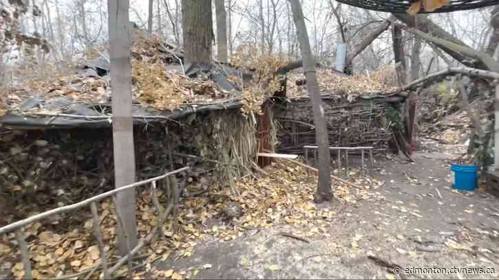 'Elaborate encampment' with solar panels and mini-power grid dismantled by Edmonton police