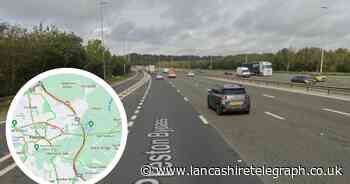 Lane closed on motorway after Jaguar driver crashes into barrier - RECAP