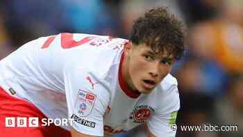 Fleetwood defender Hughes signs new contract
