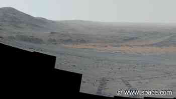 NASA's Perseverance rover gets stunning view of big Mars crater from slippery slope (video, photos)