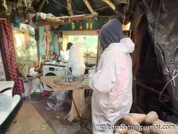 WATCH NOW: Edmonton police video shows encampment with fridge, washer, solar panels