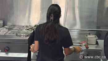 Her family came to the U.S. 20 years ago, undocumented. She's worried Trump will deport them if he wins