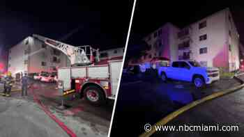 Residents evacuated as roof of Miami apartment building catches fire