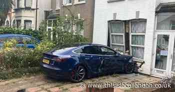 Drunk driver crashes stolen Tesla into front of Catford house