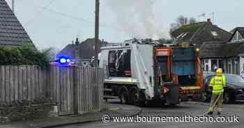 Firefighters at the scene of large bin lorry fire