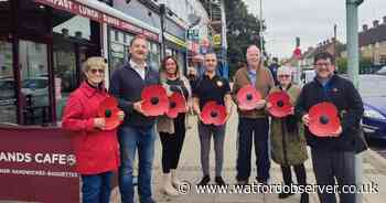 Poppies displayed on lampposts across North Watford