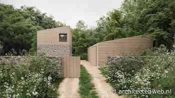 Huis van stenen en hout in open plek Limburgs bos