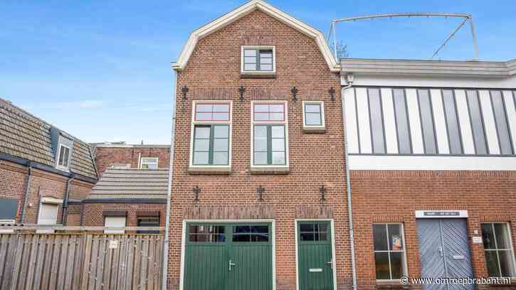 Dit schattige huis heeft geen tuin, maar wel een grote werkplaats