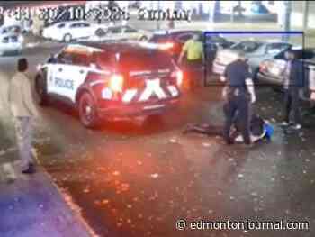 'Extremely unfortunate accident': Video emerges of Edmonton police cruiser running over woman in parking lot