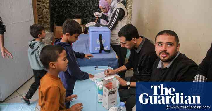 Vaccination centre and aid official’s car bombarded in Gaza, says UN