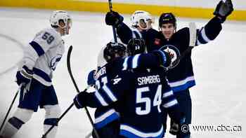 Jets top Lightning 7-4 as Ehlers makes history