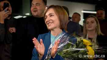Moldova re-elects pro-West president in vote marred by Russian meddling claims, bomb threats