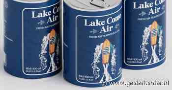 Blikken met ‘frisse lucht’ van Comomeer te koop voor toeristen in Italië