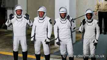 Mystery as four NASA astronauts are rushed to hospital without explanation after returning from space