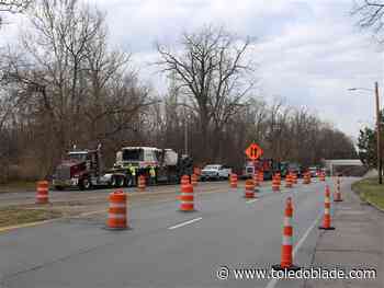 Mural installation to narrow outbound A.W. Trail to one lane