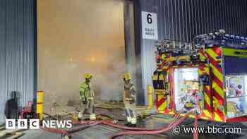 Firefighters tackle blaze at recycling centre