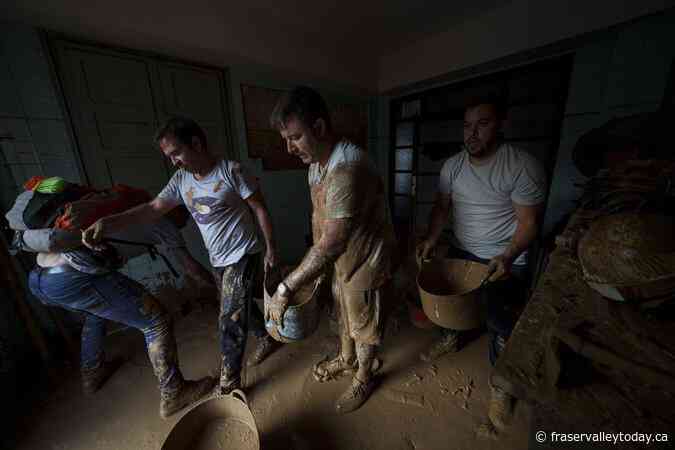 A week after Spain’s floods, families hold out hope that loved ones are not among the dead