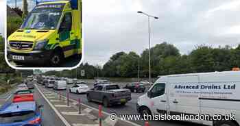 Woman in hospital after car and lorry crash on main road