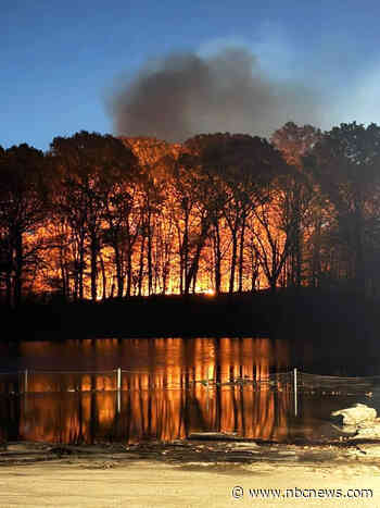 Wildfires rage across the Northeast as 27 million people remain under fire alerts