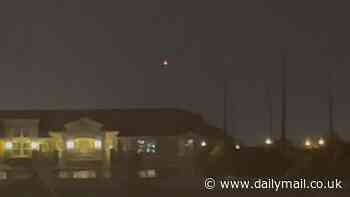 UFO swarms filmed buzzing over Area 51 and other US military sites for months after 'mothership' encounter