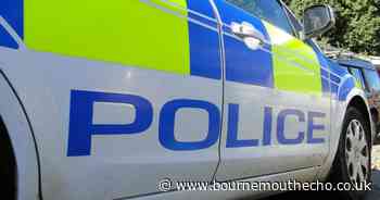 Woman arrested after car overturns from hitting telegraph pole