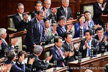 Japan's embattled leader holds on to power but faces another challenge: Trump