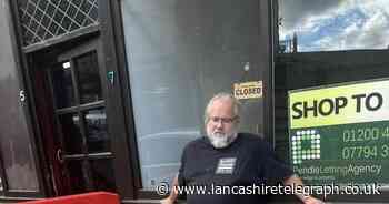 Councillor steps in front of digger to block workers 'ripping up' £40k flags