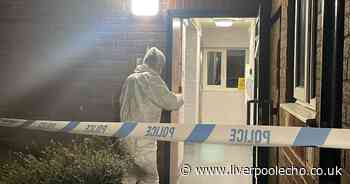 Suspect named after man stabbed multiple times inside block of flats