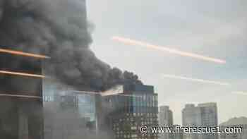 FDNY battles rooftop fire on NYC high-rise