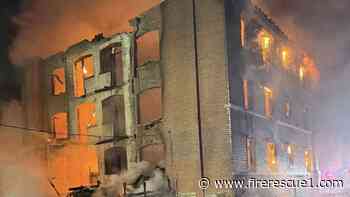 Mo. firefighters battle abandoned apartment fire