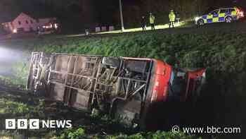 Six children rescued after bus crashes into ditch