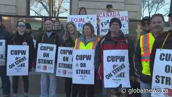 Lethbridge postal workers picket downtown during nationwide Canada Post strike